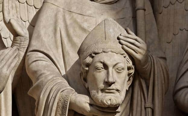 A san Dionisio se le representa sosteniendo su propia cabeza.